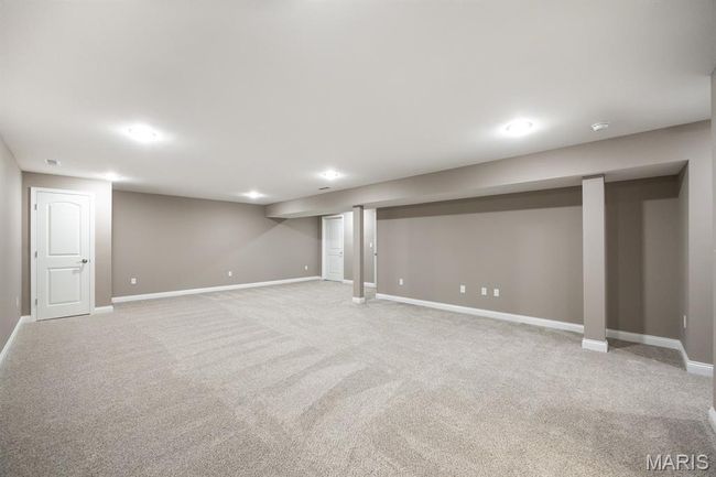 Lower Level with media wall and recessed lighting | Image 24