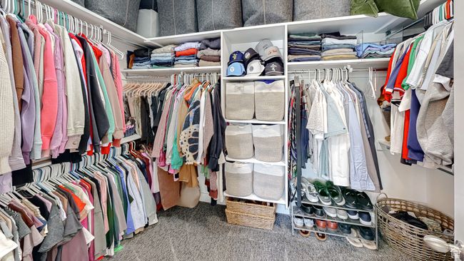 Spacious closet featuring carpet floors | Image 41