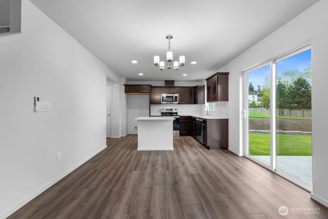 Photographs are for illustrative purposes only. Features, finishes, interior/exterior colors, landscaping and floorplan shown may vary from actual homes built. | Image 12