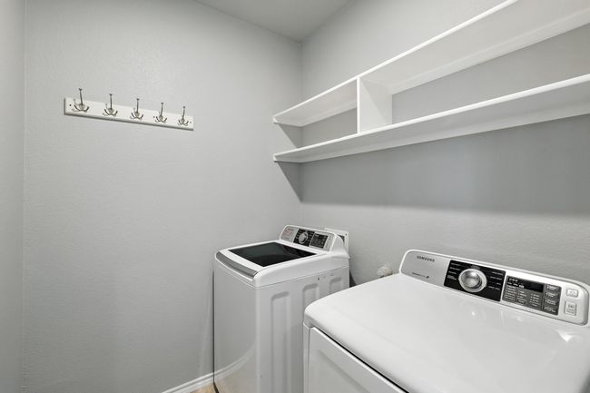 Laundry room with independent washer and dryer | Image 9