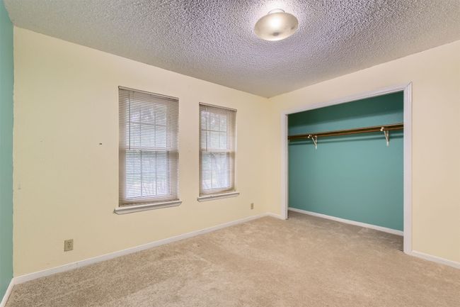 bedroom with closet | Image 17