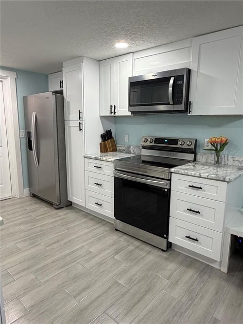 e-14062 Palm St, MADEIRA BEACH, FL, 33708-2217 | Card Image