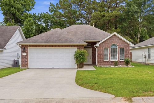 1004 Oakglen Dr, Conroe, TX, 77303-7602 | Card Image