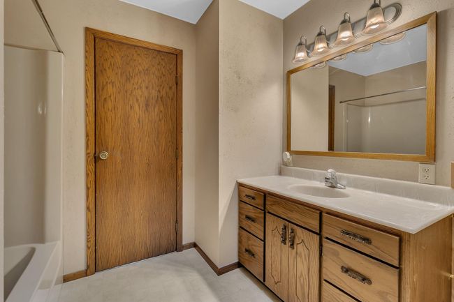 Main Floor Primary/Owner's Bedroom with walk-through Bathroom | Image 15