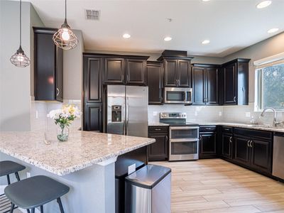 Upgraded kitchen w/ breakfast bar | Image 3