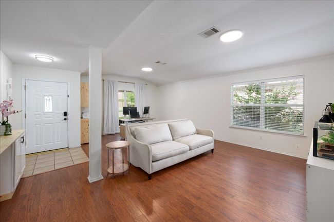 This formal living and dining area can also be used as a flex space with an office! | Image 28