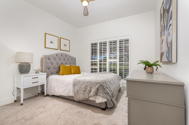 Bedroom with carpet | Image 23