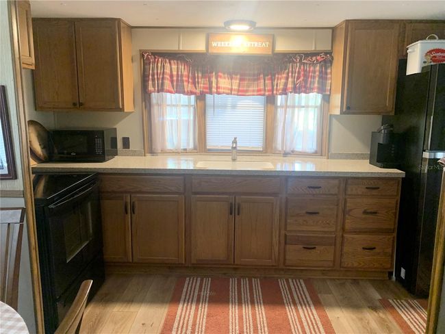 24645 Ne 177 Th Ter, House other with 2 bedrooms, 1 bathrooms and null parking in Fort Mc Coy FL | Image 56