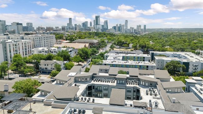 Aerial view of city skyline in relation to 2502 Leon | Image 26