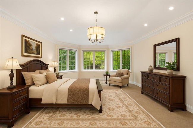 Bedroom featuring multiple windows, a chandelier, ornamental molding, recessed lighting, and light colored carpet | Image 15