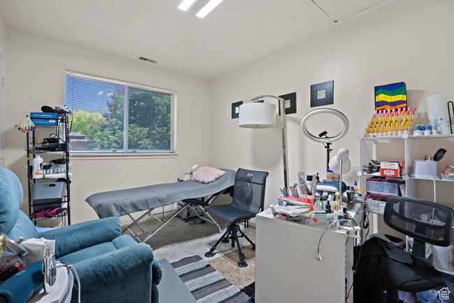 Office space featuring attic access | Image 40