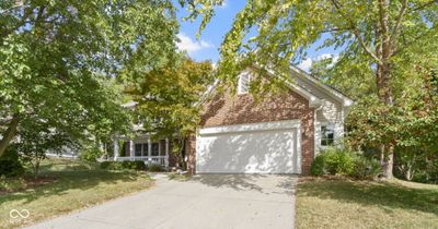 This photo shows off the oversized two car garage with 5 foot extension that runs the length of the garage. Great for storage or workshop space. | Image 2