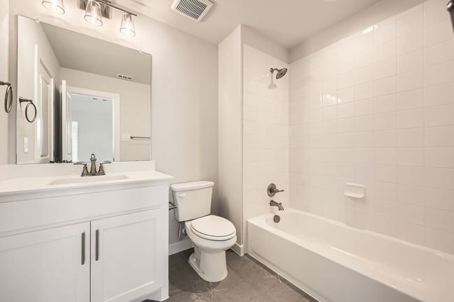 Bathroom with vanity and shower / bath combination | Image 22