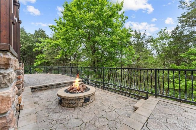 View of patio / terrace with a fire pit | Image 56