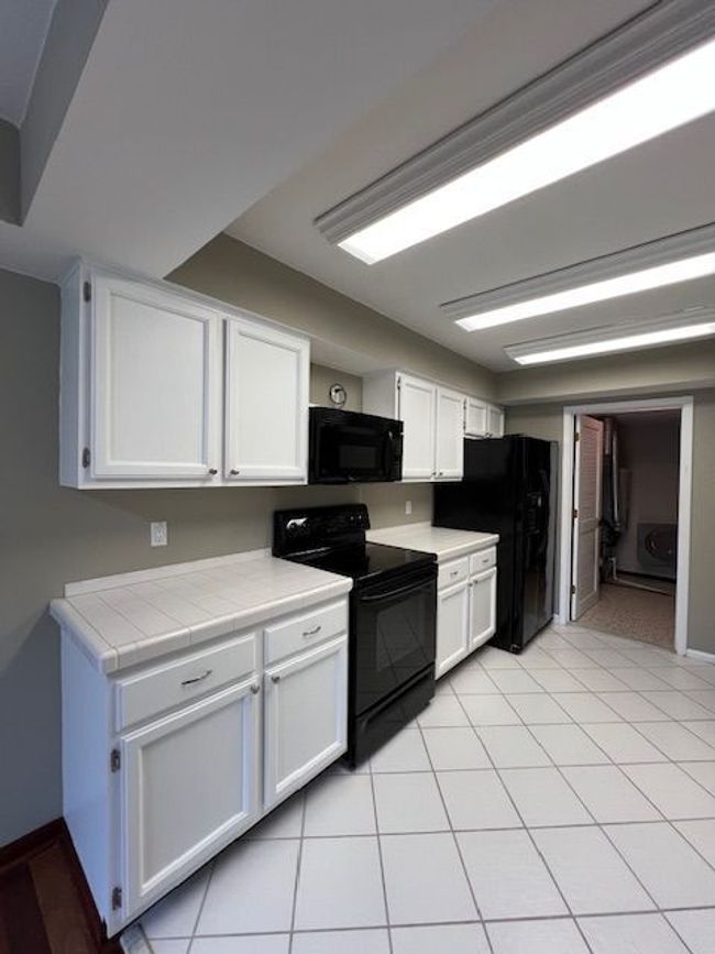 LOADS OF CABINET SPACE, DRAWERS & TILE COUNTERTOP | Image 17