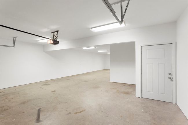 Left side of the garage will hold 4 cars. Perfect for boats/trucks/cars/ATVs/Golf carts, all the toys will fit in here! | Image 29