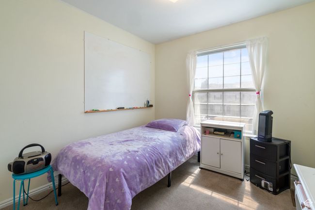 View of carpeted bedroom | Image 12