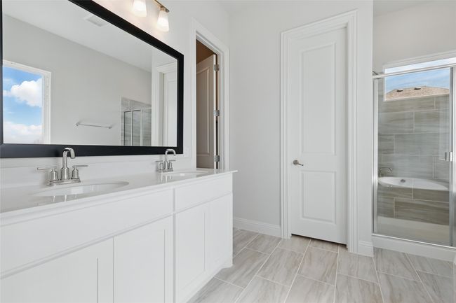 Full bath with a wealth of natural light, a shower stall, and a sink | Image 19