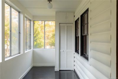 View of unfurnished sunroom | Image 3