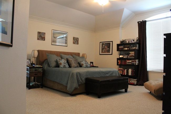 Bedroom with carpet and ornamental molding | Image 8