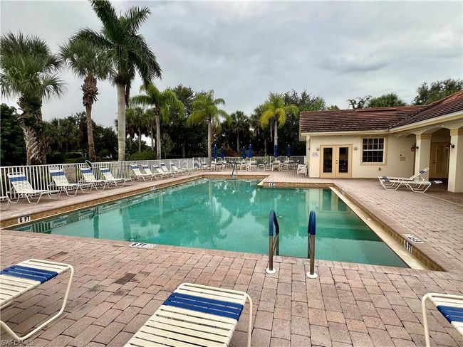 View of heated pool and seating | Image 37