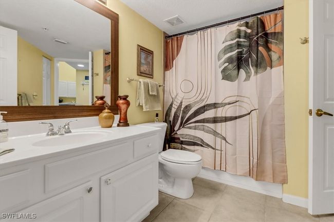 Bathroom featuring vanity and tile patterned flooring | Image 15