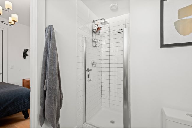Bathroom with a shower stall and ensuite bath | Image 24
