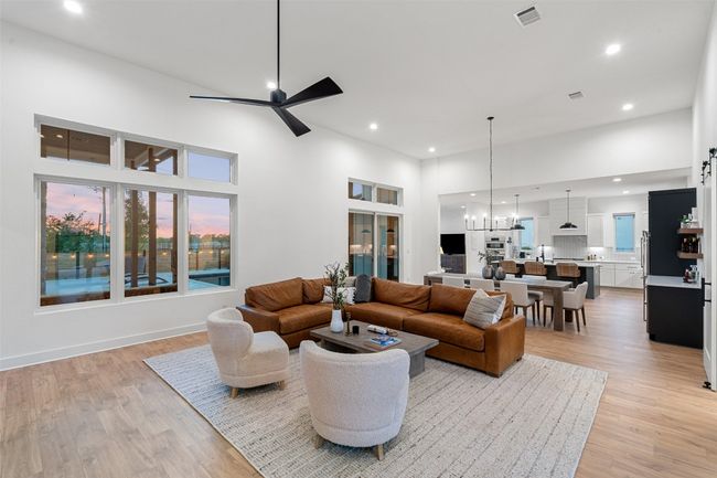 14ft+ ceilings in this one story 5 bedroom stunner! Open concept floorplan that is a WOW as soon as you walk through the front door. | Image 5