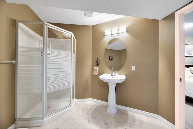 266 Rockborough Green Nw, House other with 5 bedrooms, 4 bathrooms and 4 parking in Calgary AB | Image 27
