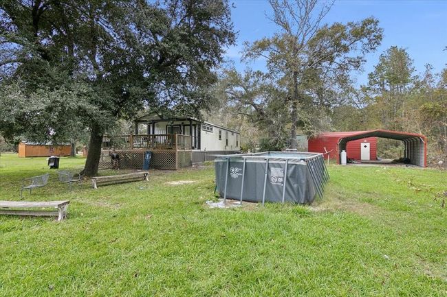 13271 Mustang Trl, House other with 2 bedrooms, 1 bathrooms and null parking in Hamshire TX | Image 20