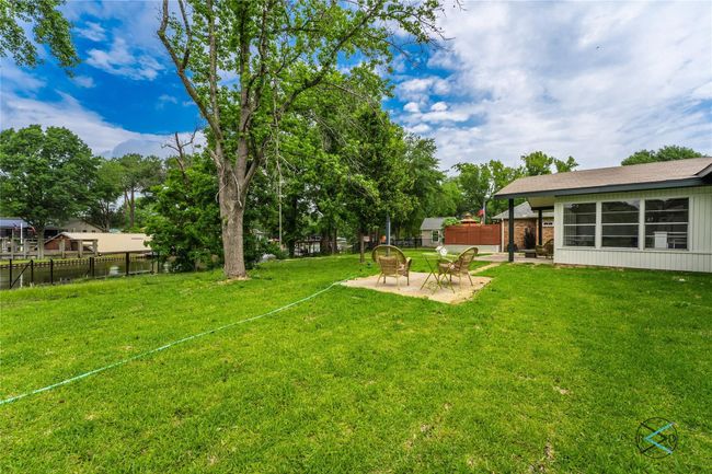 View of yard featuring a patio area | Image 14