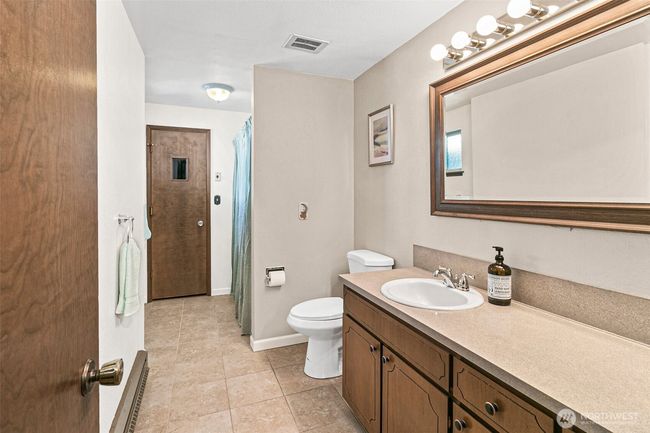 LARGE Secondary Bathroom. Freshly Painted too! That door at the end is a Sauna. | Image 22