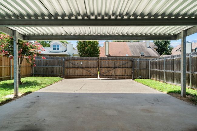 View of patio with a gate | Image 30