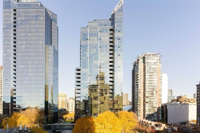 View of building exterior with a view of city | Image 8
