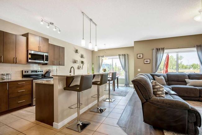 5 Drake Landing Loop, House detached with 3 bedrooms, 2 bathrooms and 5 parking in Okotoks AB | Image 5