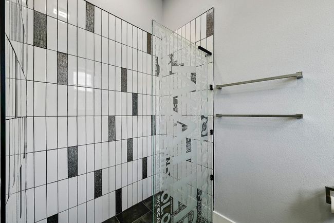 The guest ensuite walk-in shower also comes with custom frameless glass to inspire your guests. | Image 26
