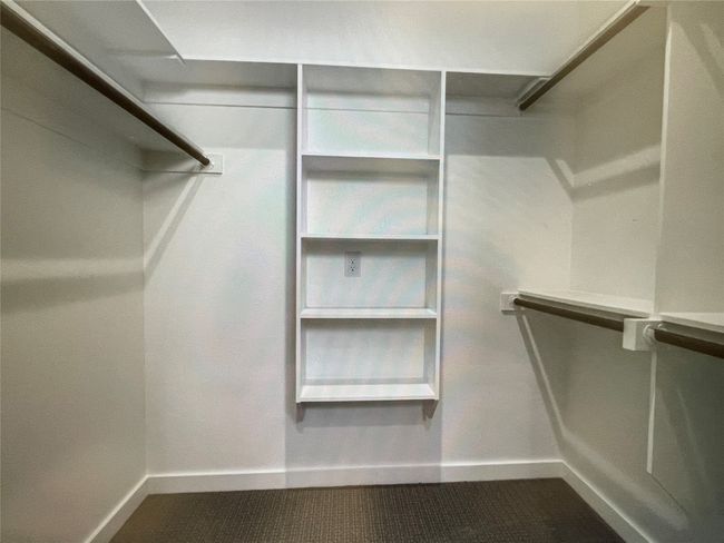 View of walk in closet | Image 7