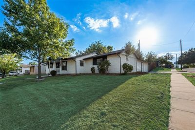 Ranch-style home with a front yard | Image 3