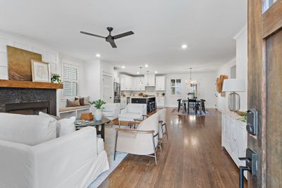 Inside, you'll find gorgeous hardwood floors throughout the home. | Image 3