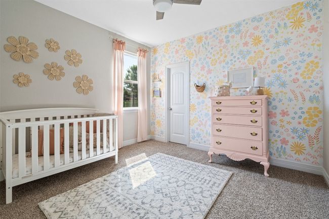 Other secondary bedroom downstairs located near bathroom and laundry room | Image 16