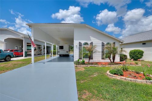 1083 Motorcoach Dr, POLK CITY, FL, 33868-5113 | Card Image