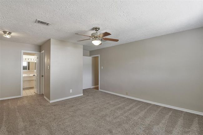 Spacious primary bedroom and bathroom | Image 28
