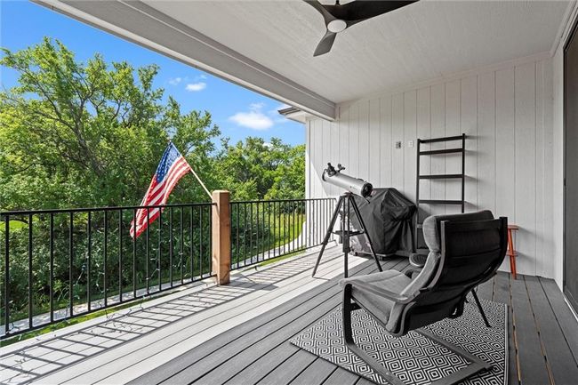 Wooden terrace with a ceiling fan and grilling area | Image 35