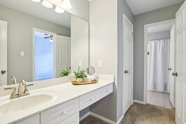 Immaculately maintained bathrooms with modern updates throughout. | Image 24