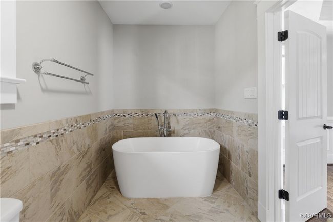Second floor primary bath, soaking tub | Image 25