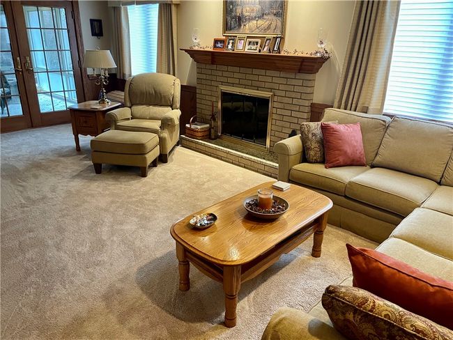 A won, derful place to watch tv, read...relax with friends. The gas fireplace is wonderful. | Image 6