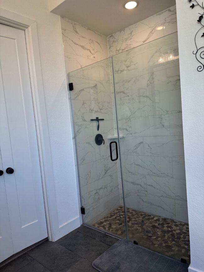 Bathroom with a marble finish shower | Image 26