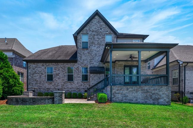 Another view of the back that overlooks a spacious and private back yard. | Image 55
