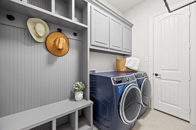 Well Appointed Laundry Room with Oversized Storage Closet | Image 27