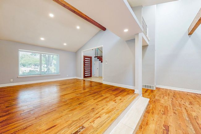 Formal living area with huge windows | Image 5
